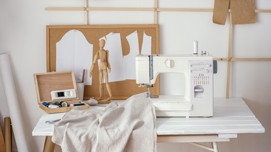 front-view-tailoring-studio-with-sewing-machine 1